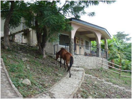 The Green Ranch Hotel คูมาซี ภายนอก รูปภาพ